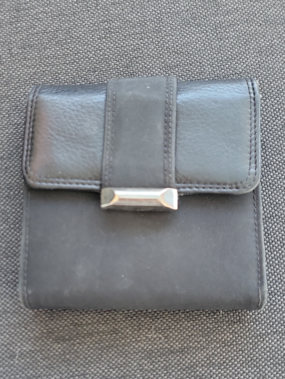 Sleek Black Compact Wallet with Silver Clasp
